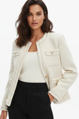 Ivory tweed blazer for women with gold button details, elegant close-up fashion shot