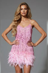 Playful pink fringe mini dress with feather hem and spaghetti straps for women